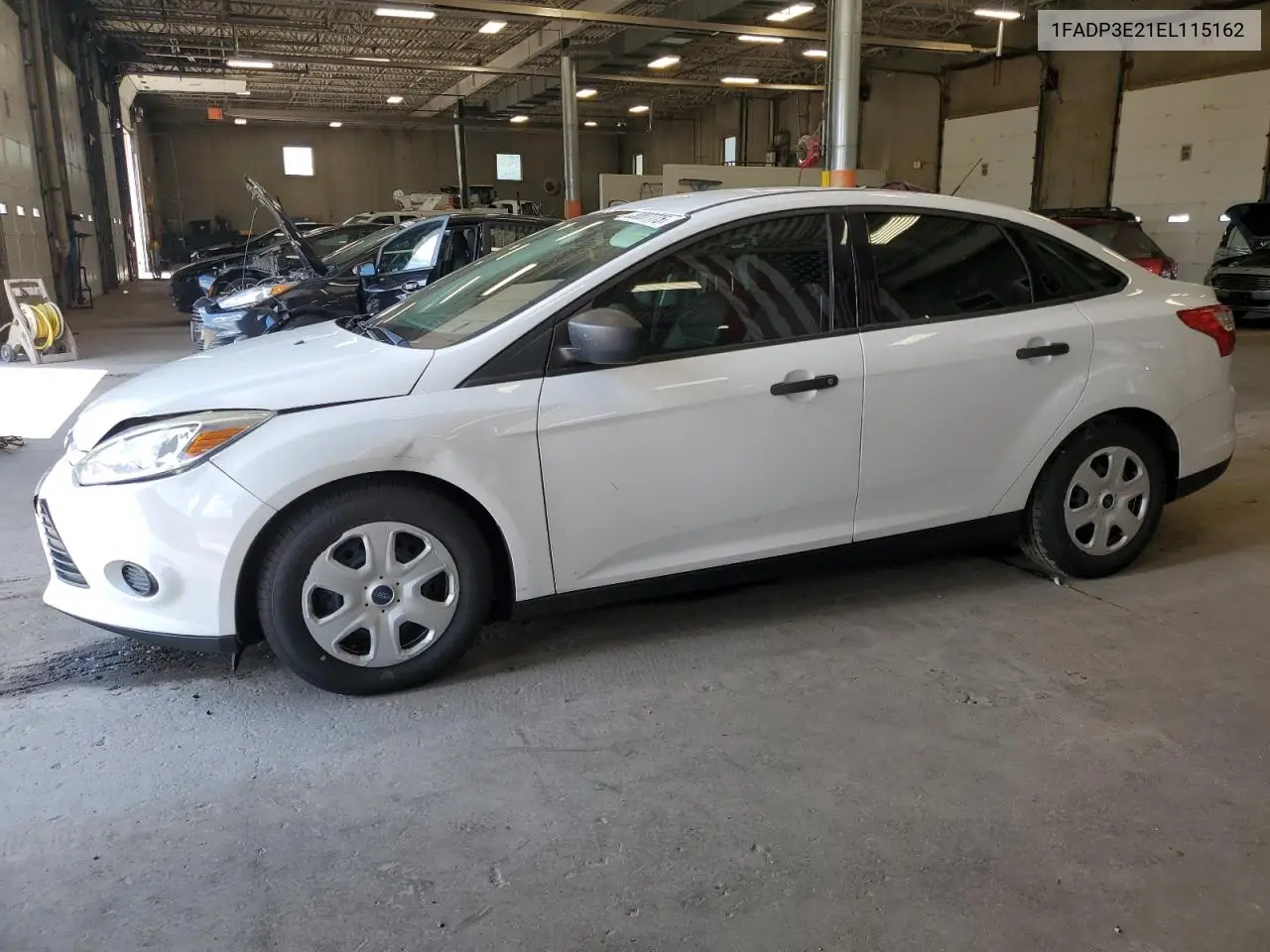 2014 Ford Focus S VIN: 1FADP3E21EL115162 Lot: 63087775