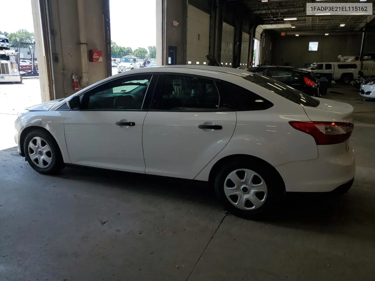 2014 Ford Focus S VIN: 1FADP3E21EL115162 Lot: 63087775