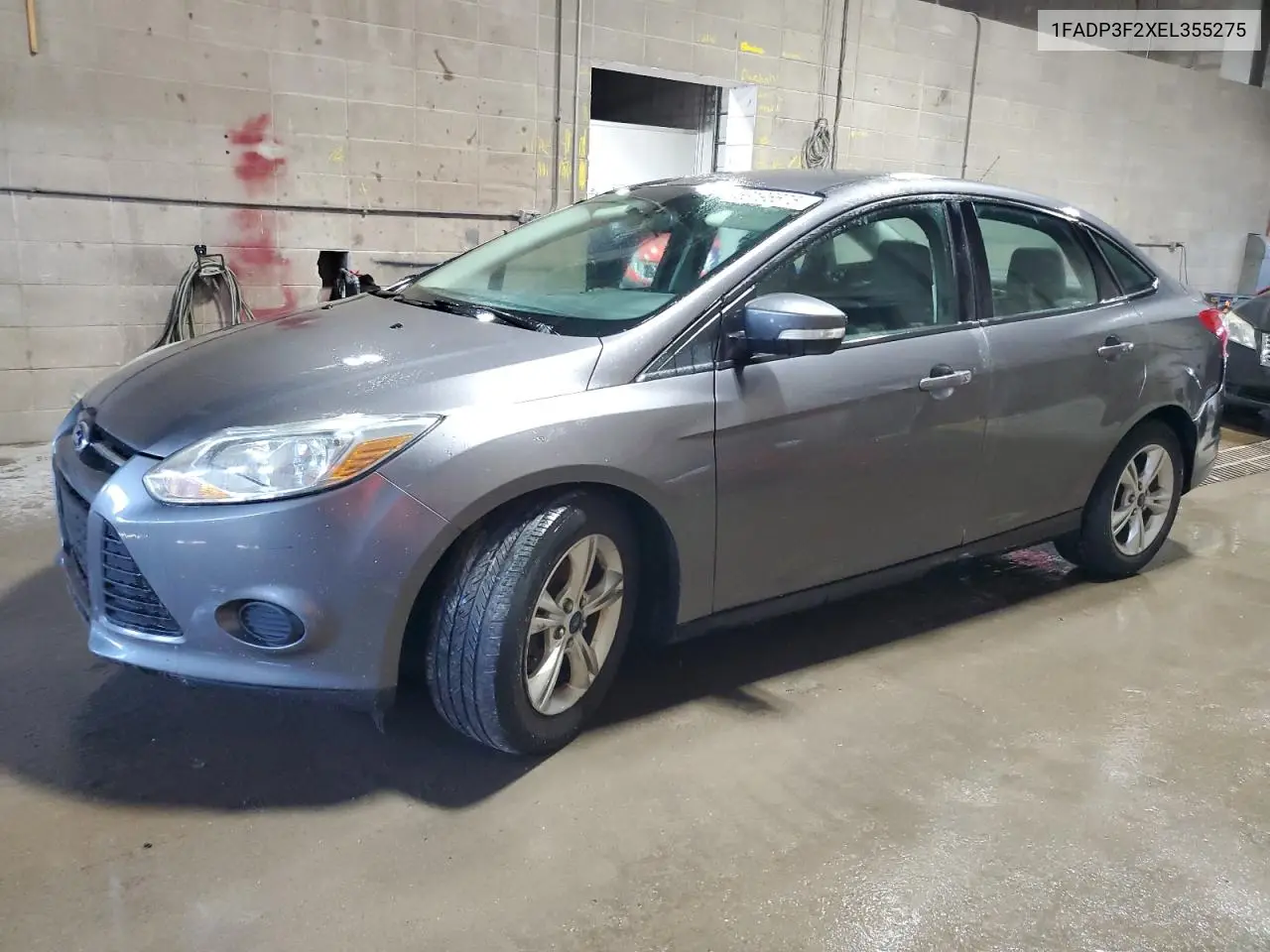 2014 Ford Focus Se VIN: 1FADP3F2XEL355275 Lot: 63196675