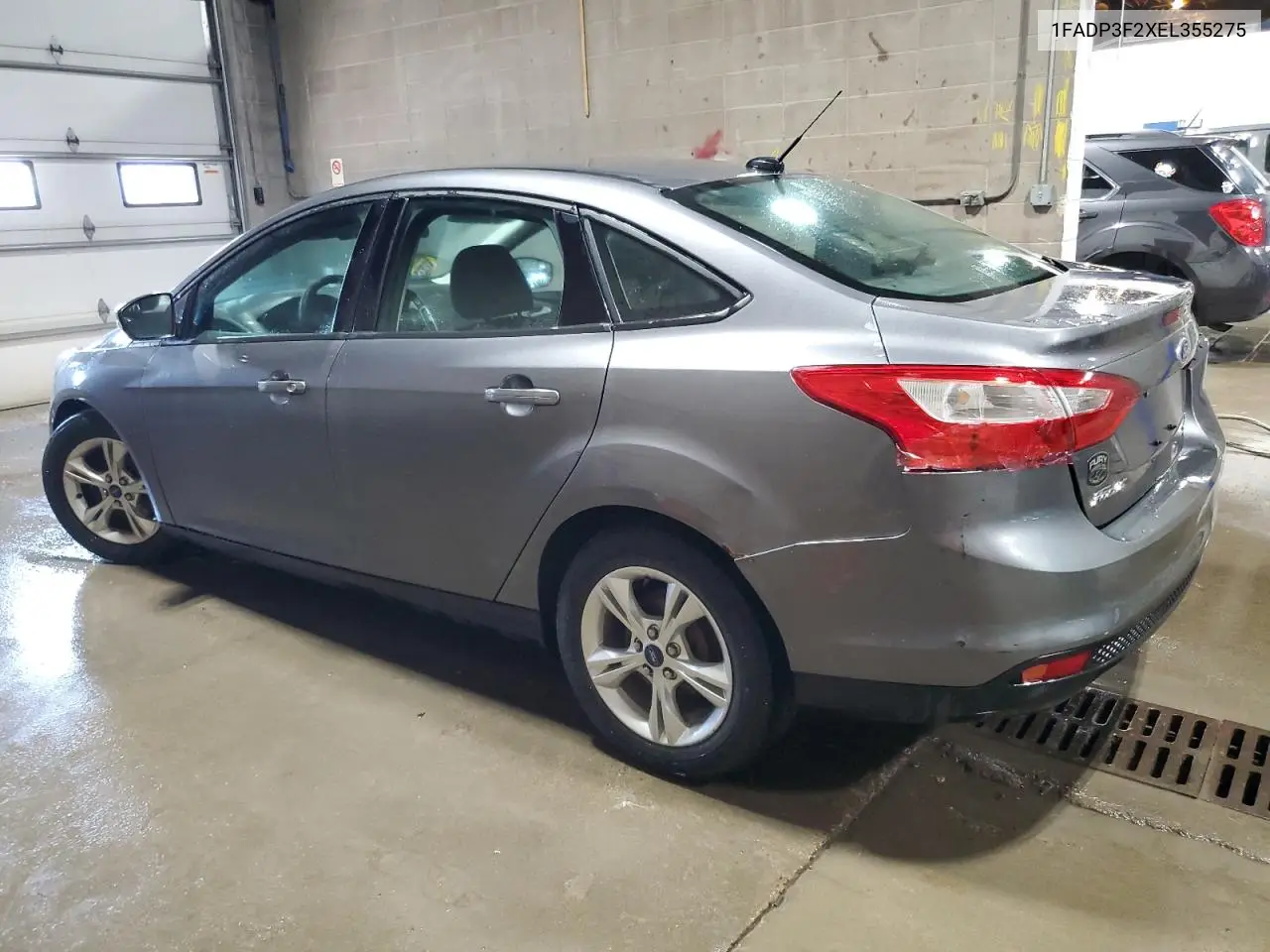 2014 Ford Focus Se VIN: 1FADP3F2XEL355275 Lot: 63196675