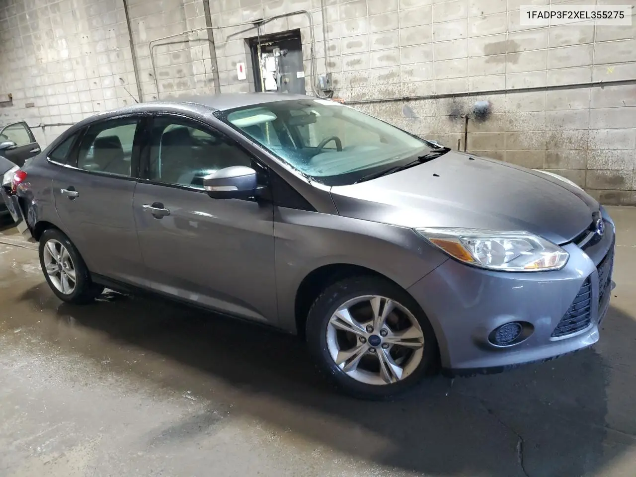 2014 Ford Focus Se VIN: 1FADP3F2XEL355275 Lot: 63196675