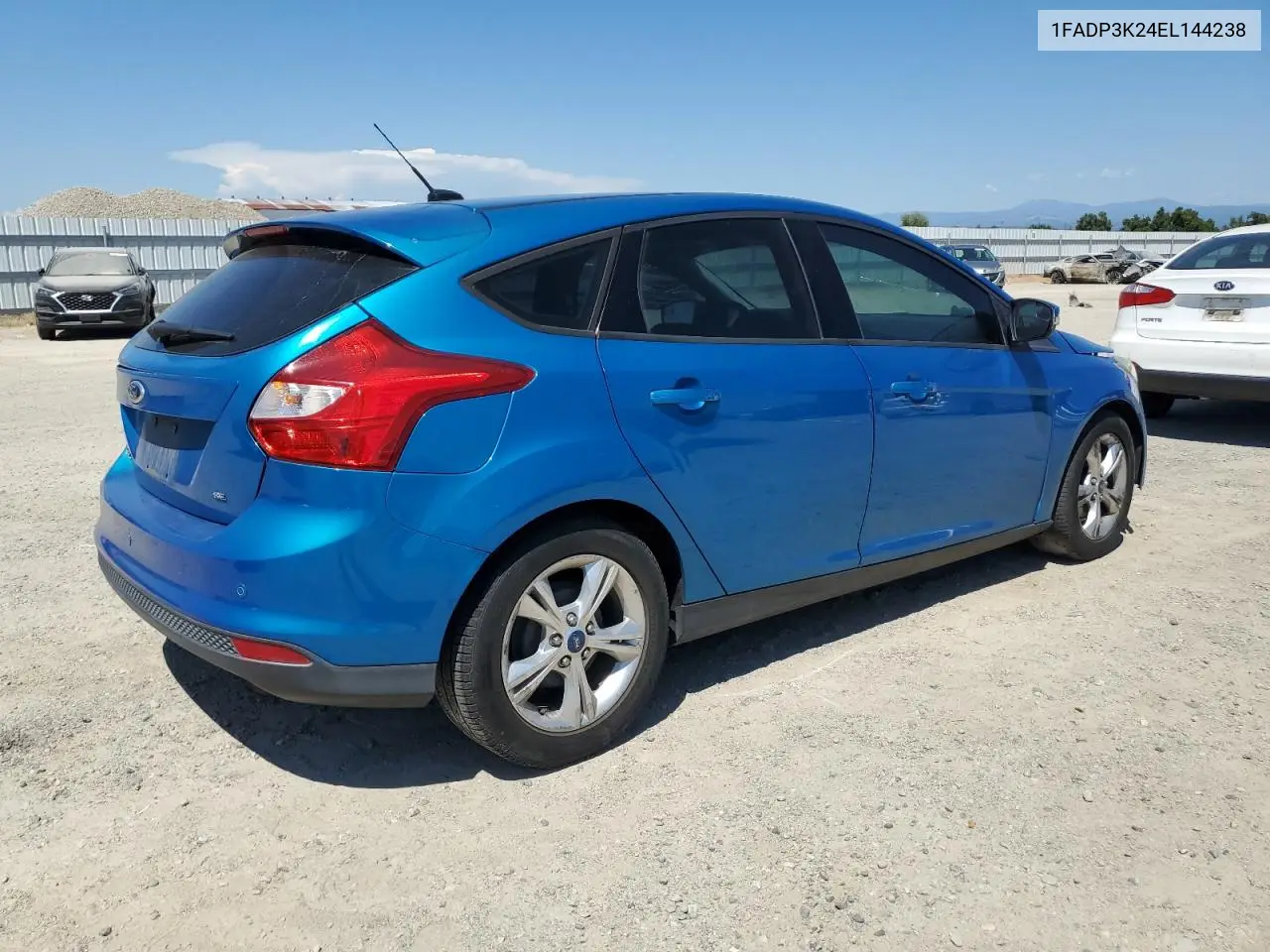 2014 Ford Focus Se VIN: 1FADP3K24EL144238 Lot: 63493205
