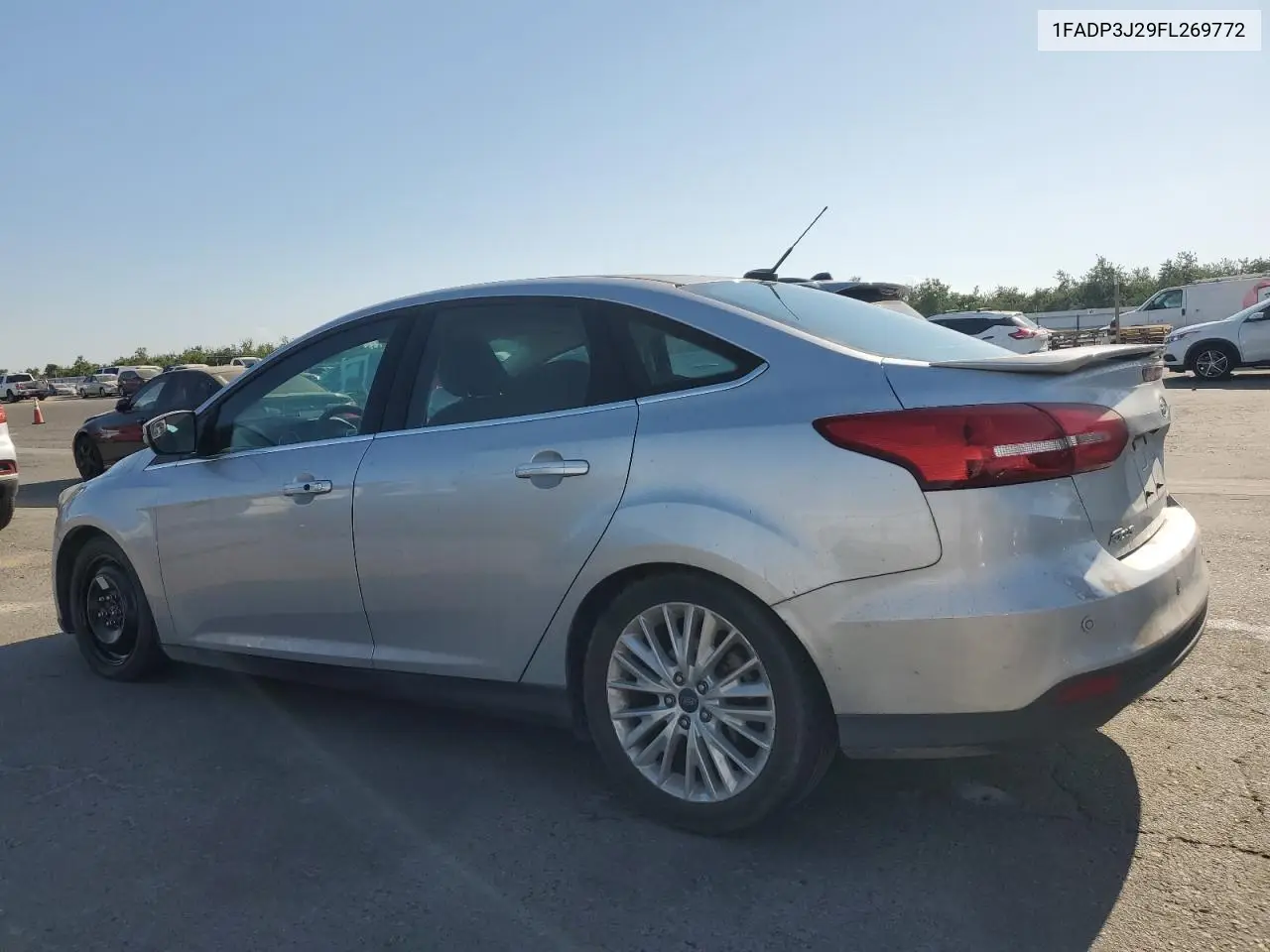 2015 Ford Focus Titanium VIN: 1FADP3J29FL269772 Lot: 63290225