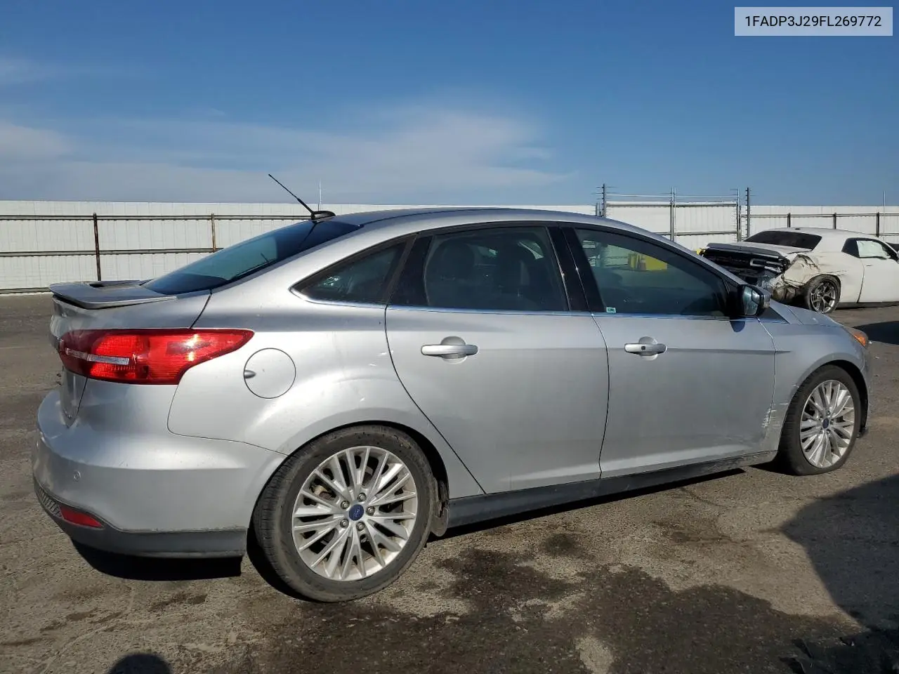2015 Ford Focus Titanium VIN: 1FADP3J29FL269772 Lot: 63290225