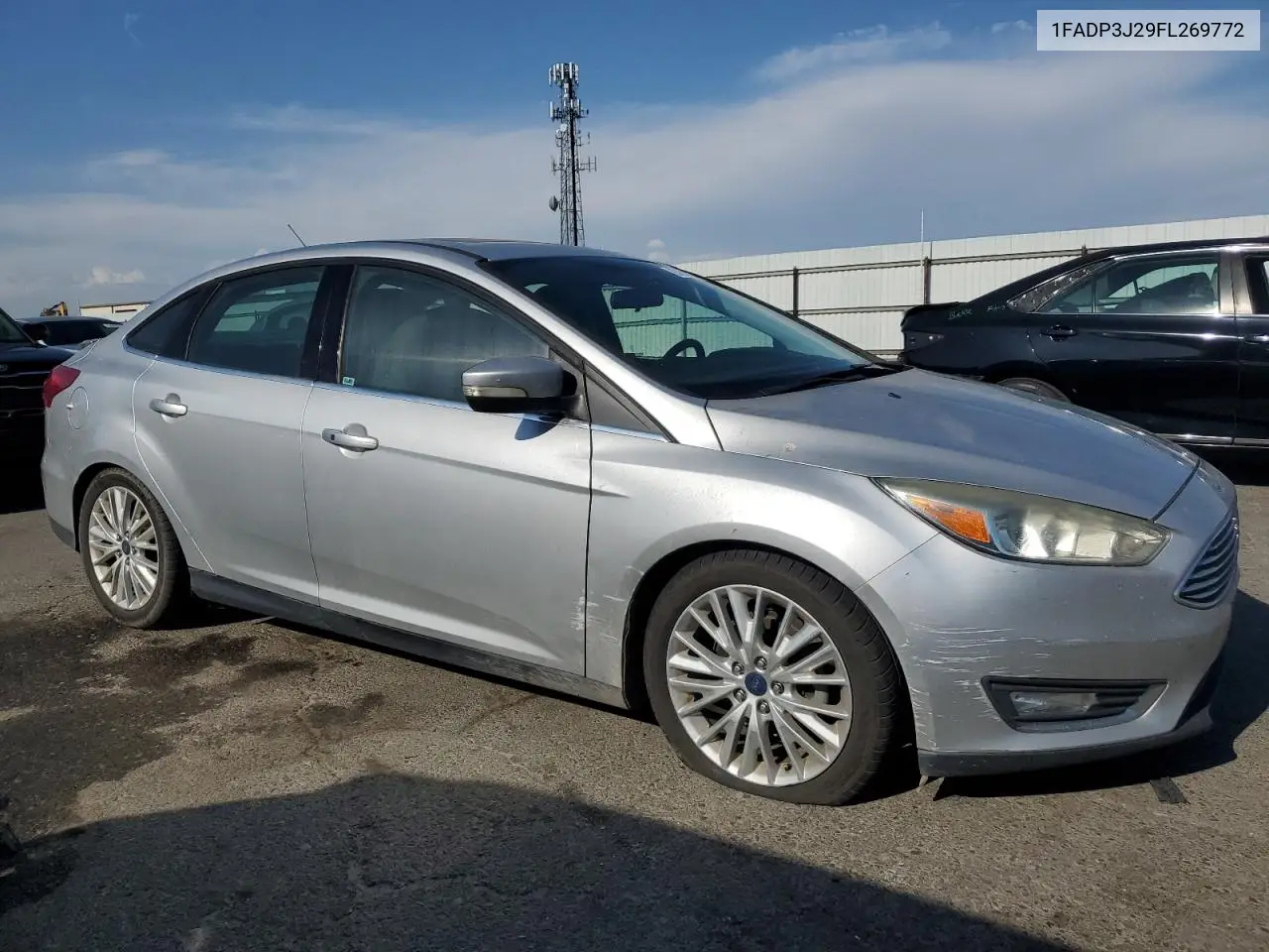2015 Ford Focus Titanium VIN: 1FADP3J29FL269772 Lot: 63290225