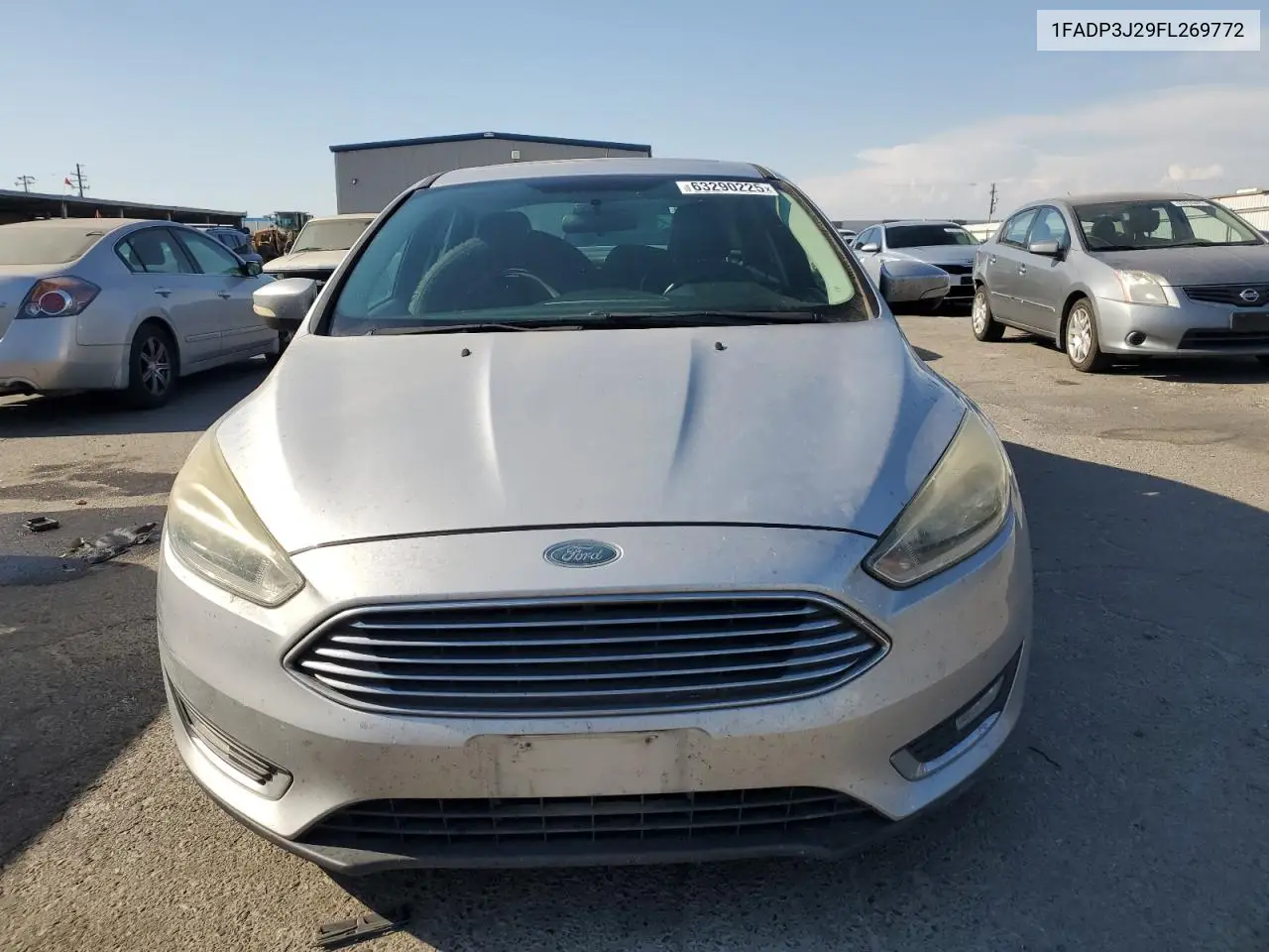 2015 Ford Focus Titanium VIN: 1FADP3J29FL269772 Lot: 63290225