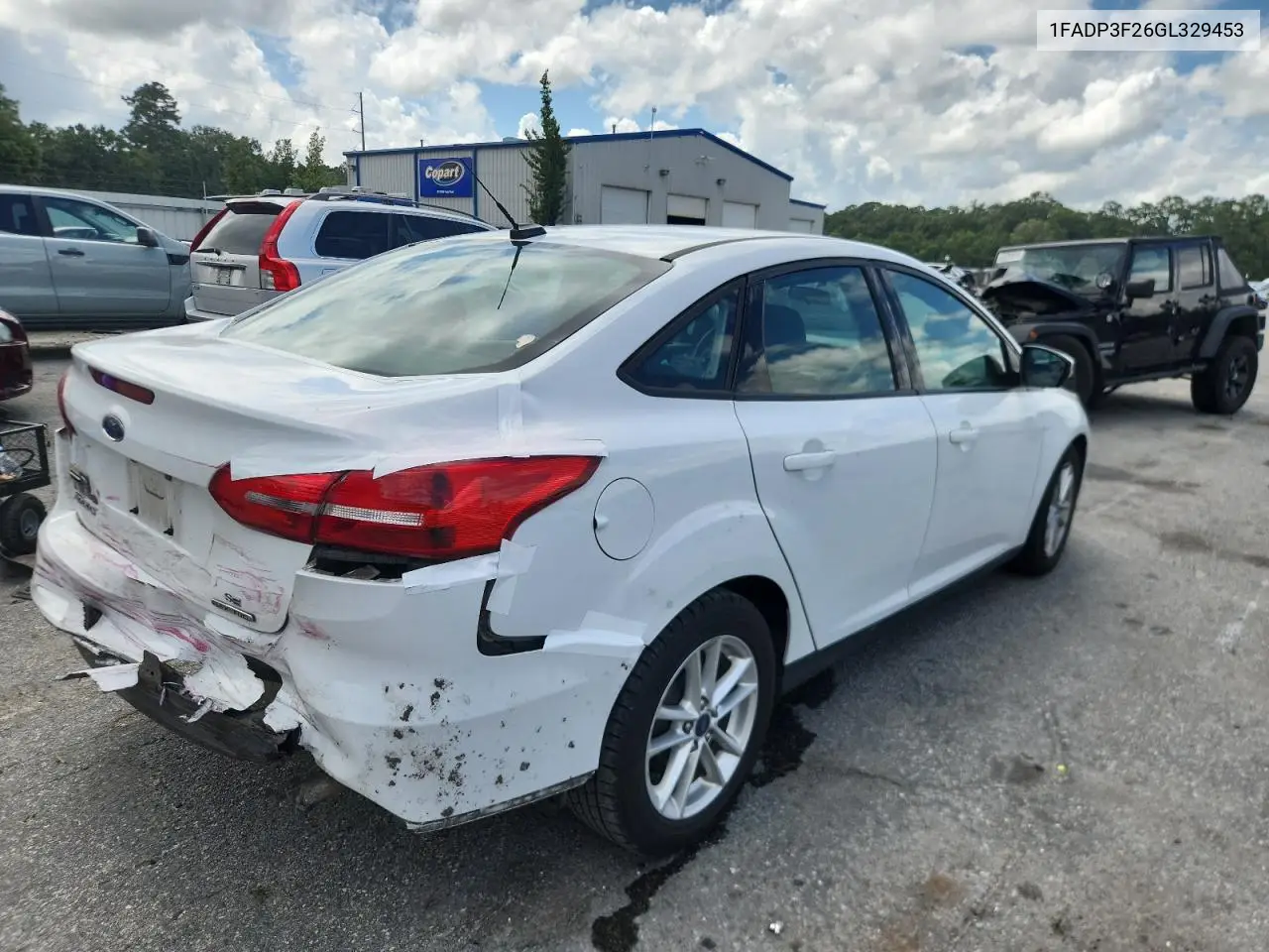 2016 Ford Focus Se VIN: 1FADP3F26GL329453 Lot: 61548325
