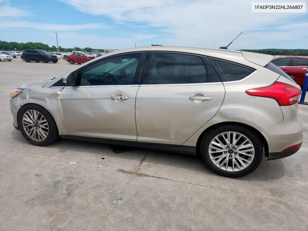 2017 Ford Focus Titanium VIN: 1FADP3N22HL266807 Lot: 57071635