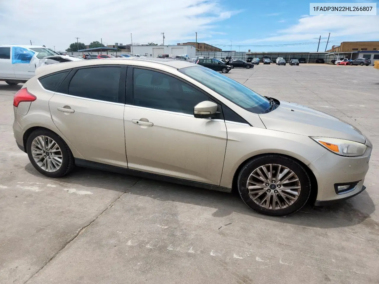 2017 Ford Focus Titanium VIN: 1FADP3N22HL266807 Lot: 57071635