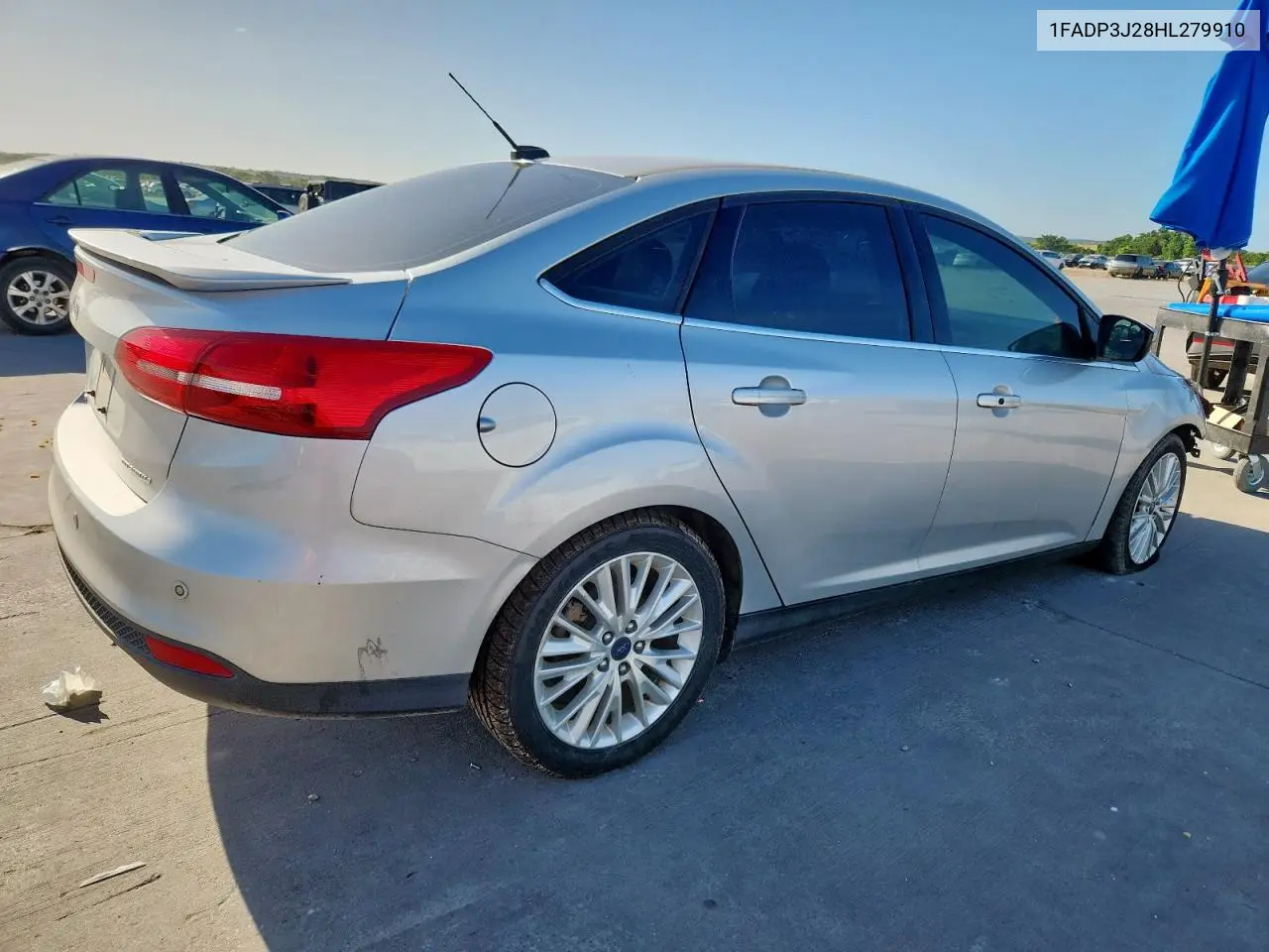 2017 Ford Focus Titanium VIN: 1FADP3J28HL279910 Lot: 62967675