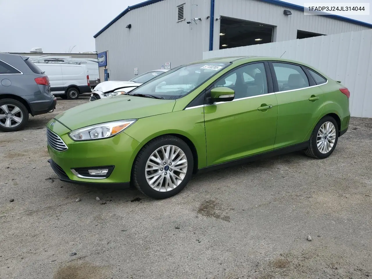 2018 Ford Focus Titanium VIN: 1FADP3J24JL314044 Lot: 57130285