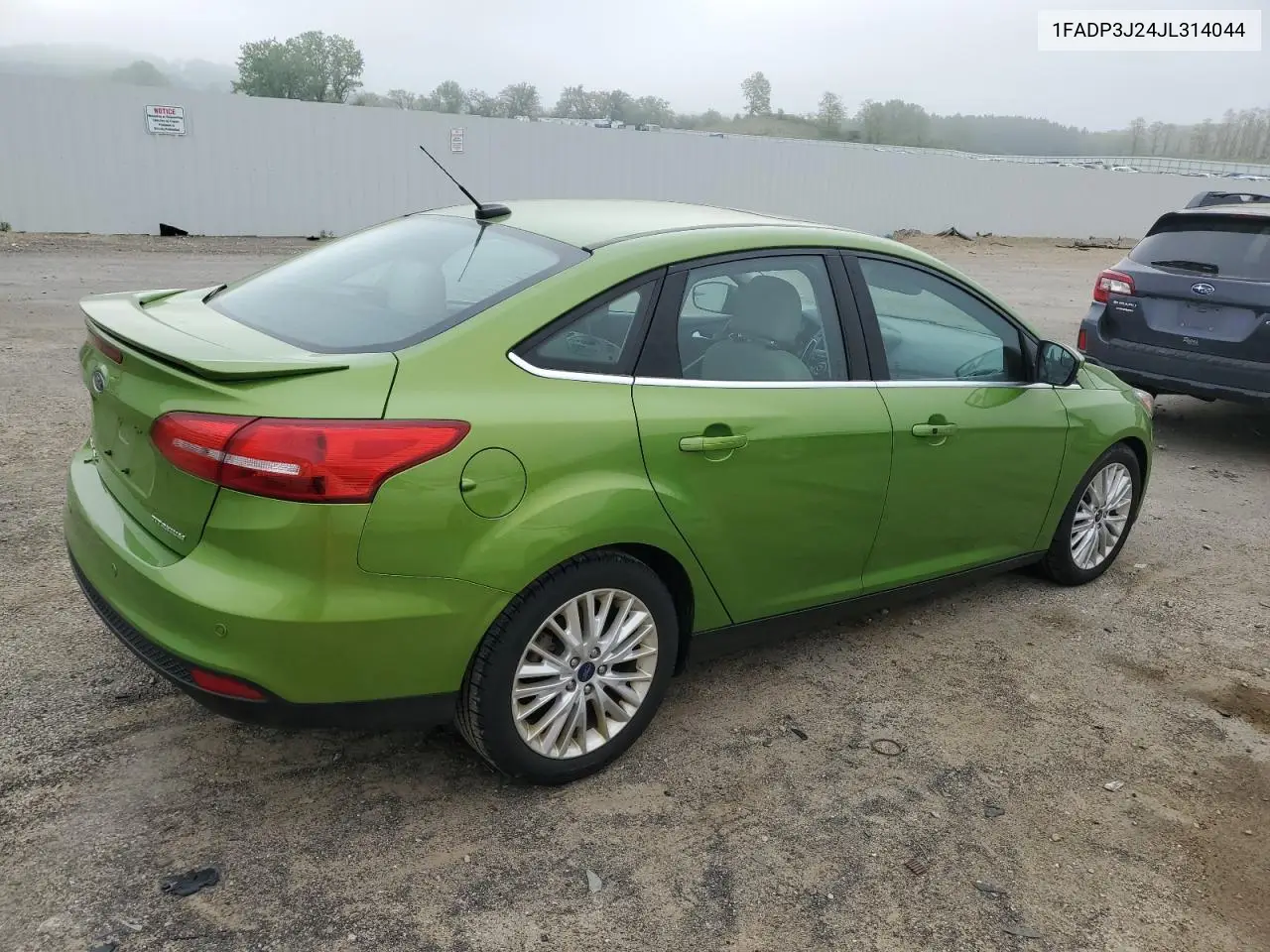 2018 Ford Focus Titanium VIN: 1FADP3J24JL314044 Lot: 57130285