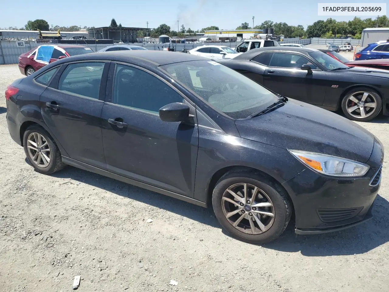 2018 Ford Focus Se VIN: 1FADP3FE8JL205699 Lot: 63300795