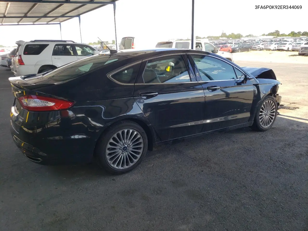 2014 Ford Fusion Titanium VIN: 3FA6P0K92ER344069 Lot: 56608295