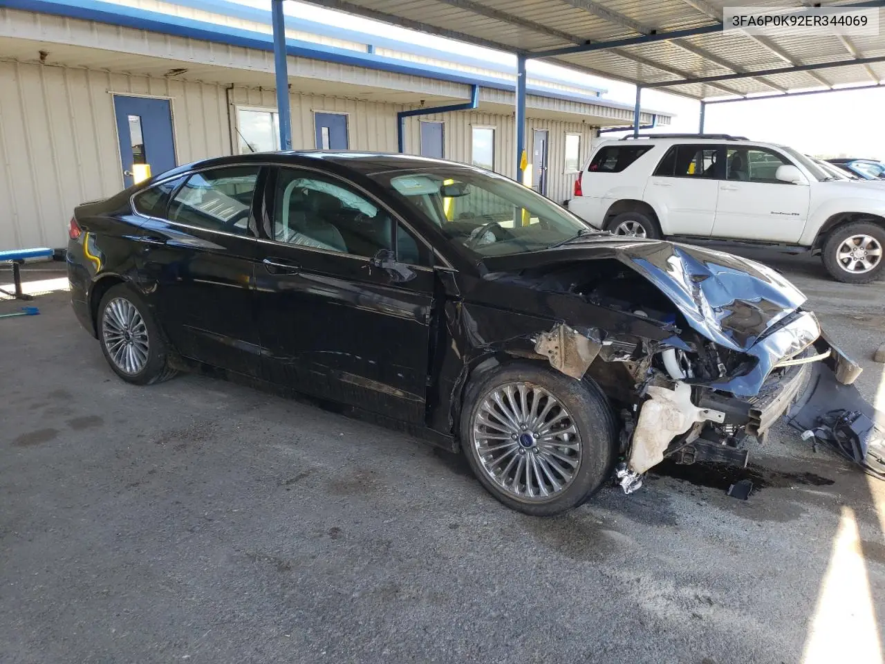2014 Ford Fusion Titanium VIN: 3FA6P0K92ER344069 Lot: 56608295