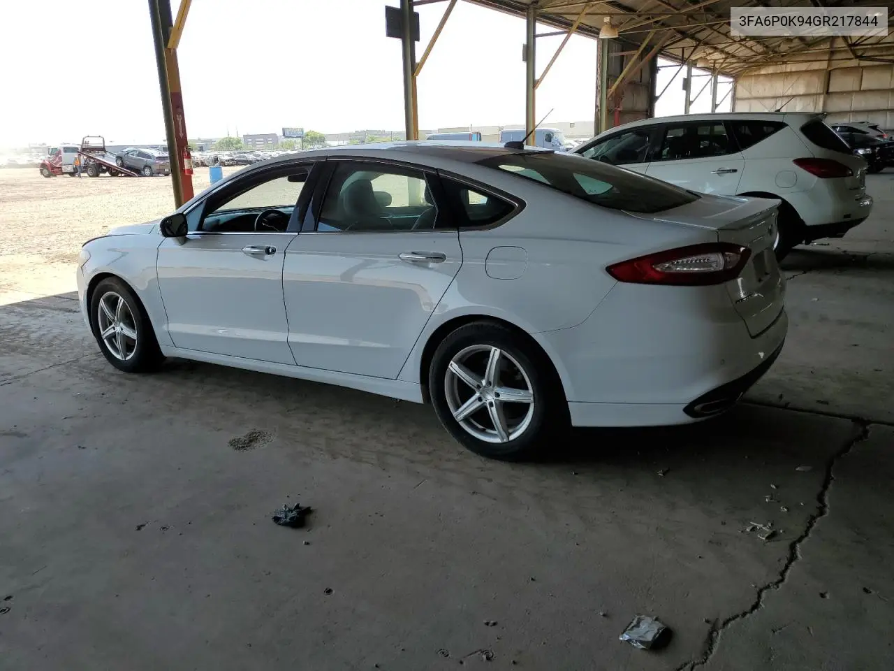 2016 Ford Fusion Titanium VIN: 3FA6P0K94GR217844 Lot: 62210495