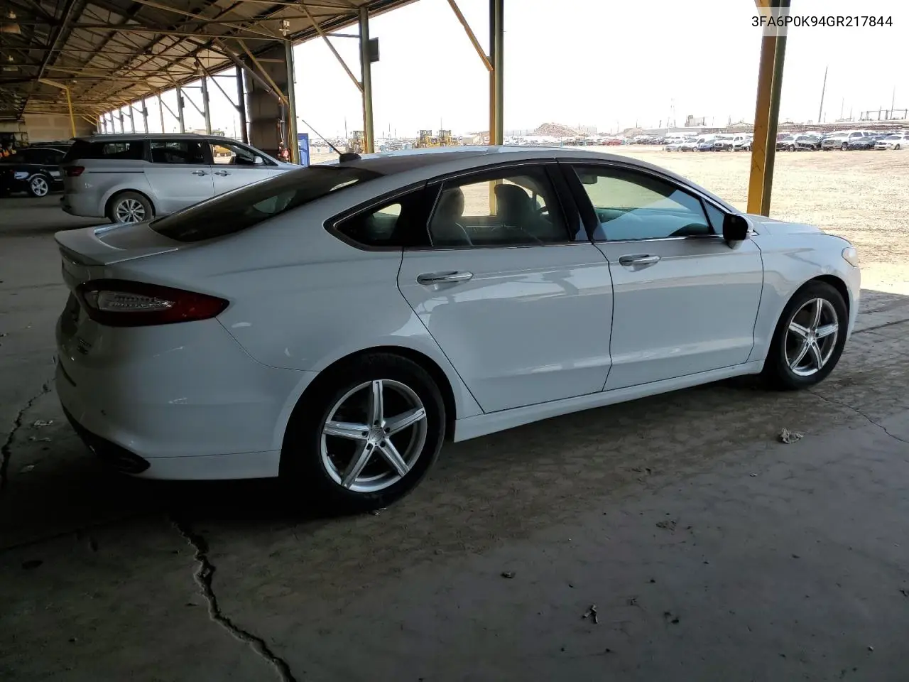2016 Ford Fusion Titanium VIN: 3FA6P0K94GR217844 Lot: 62210495
