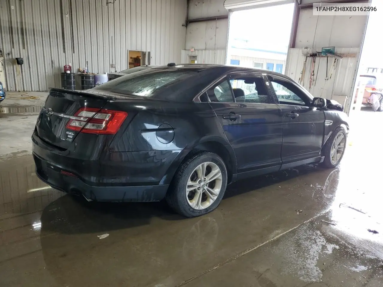 2014 Ford Taurus Sel VIN: 1FAHP2H8XEG162596 Lot: 56676965
