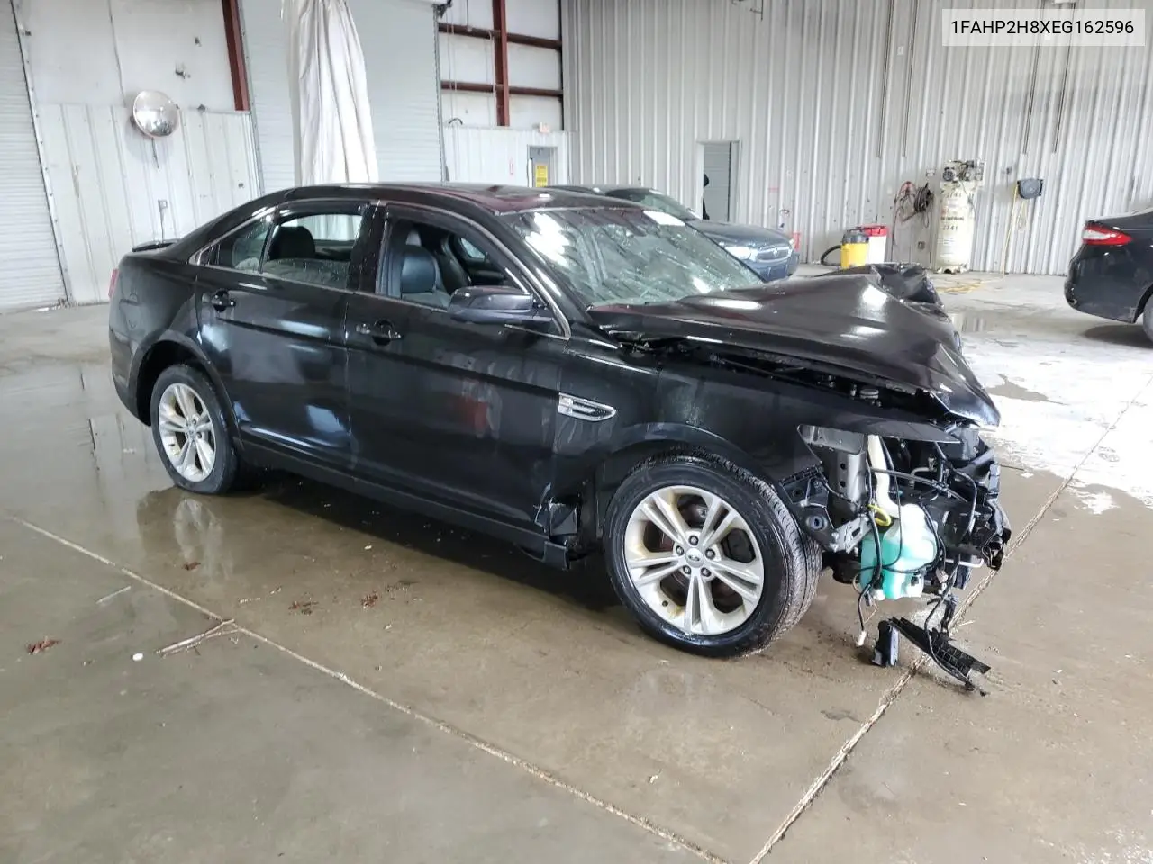 2014 Ford Taurus Sel VIN: 1FAHP2H8XEG162596 Lot: 56676965