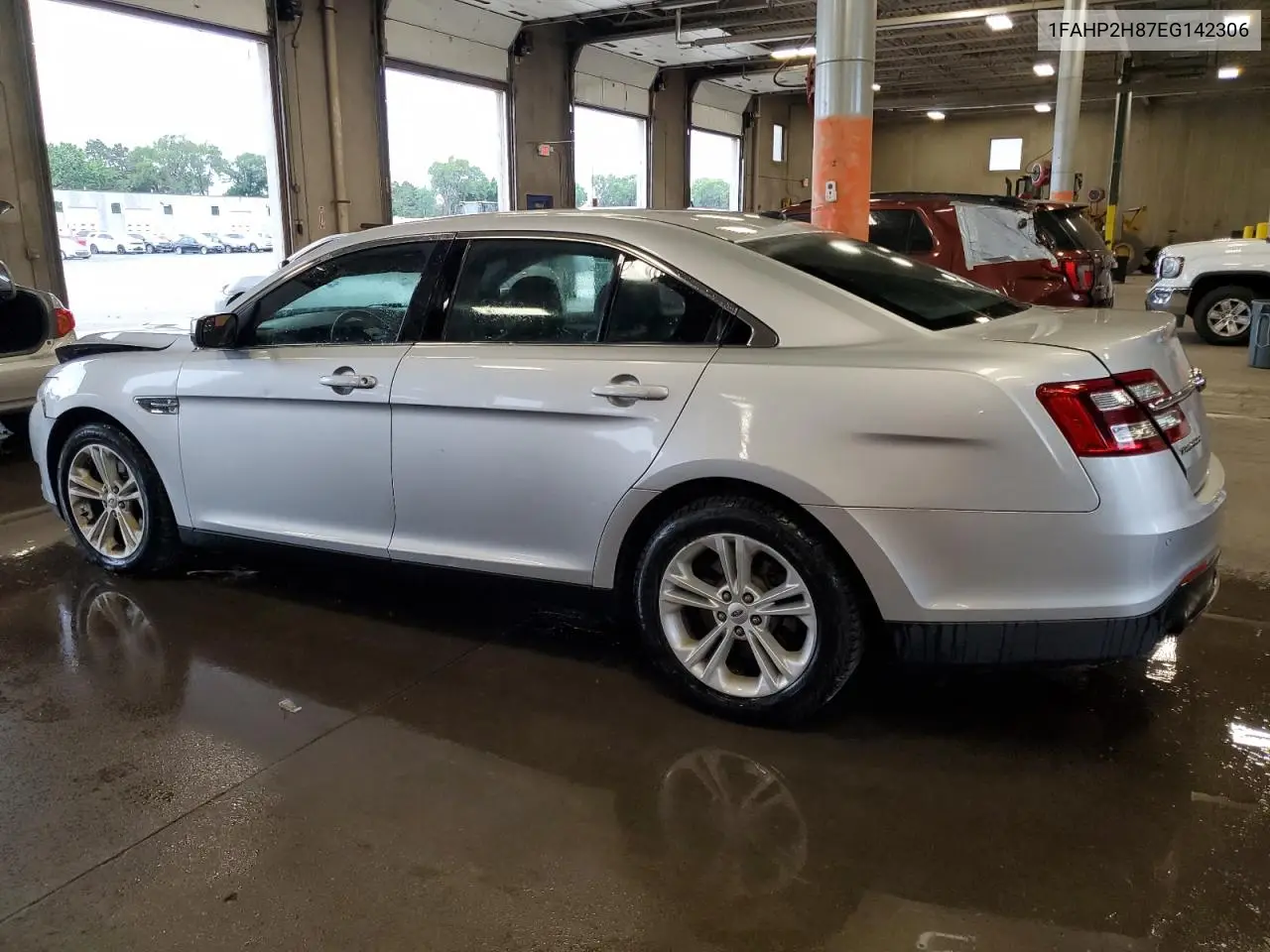 2014 Ford Taurus Sel VIN: 1FAHP2H87EG142306 Lot: 62403435