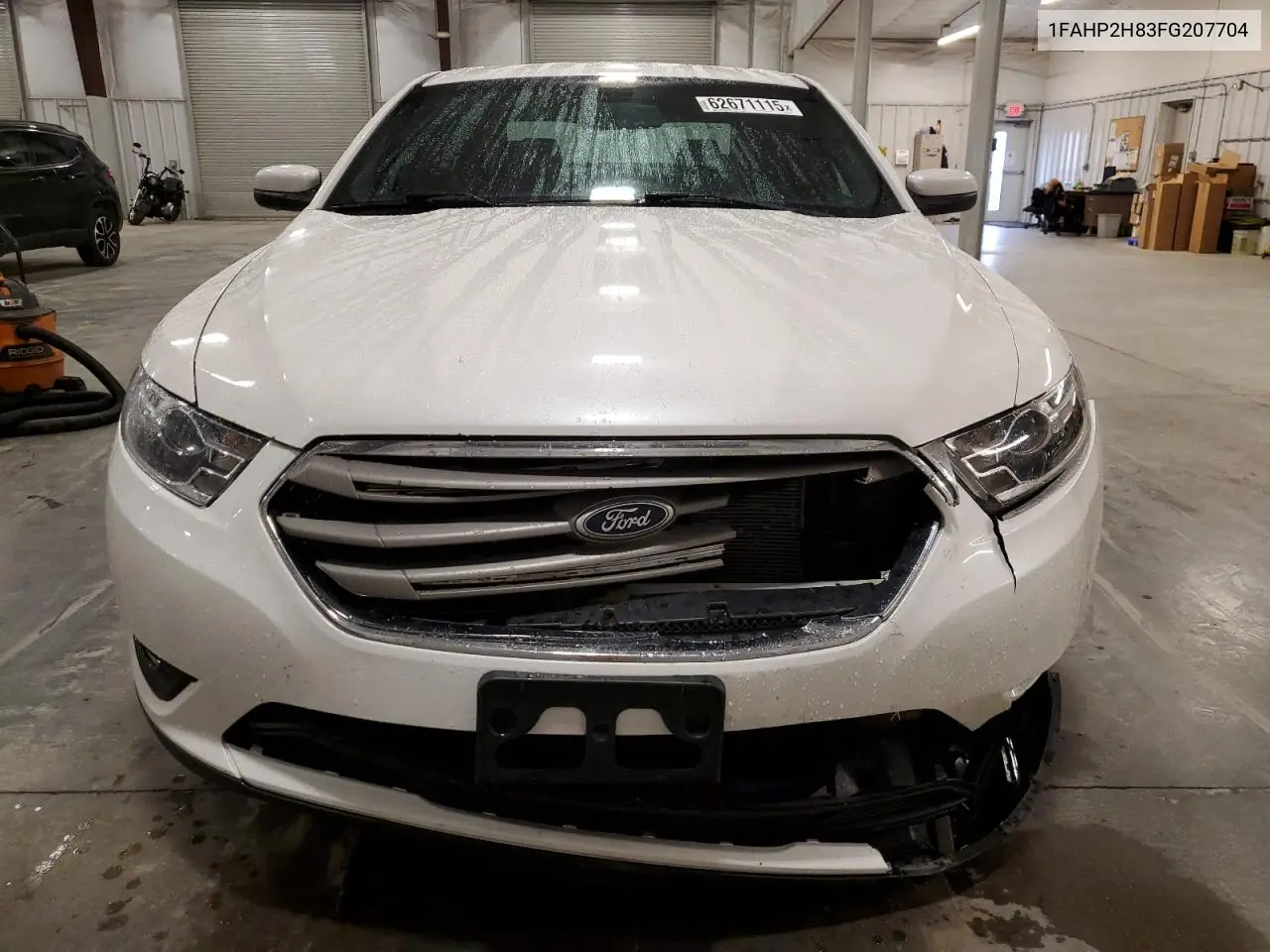 2015 Ford Taurus Sel VIN: 1FAHP2H83FG207704 Lot: 62671115