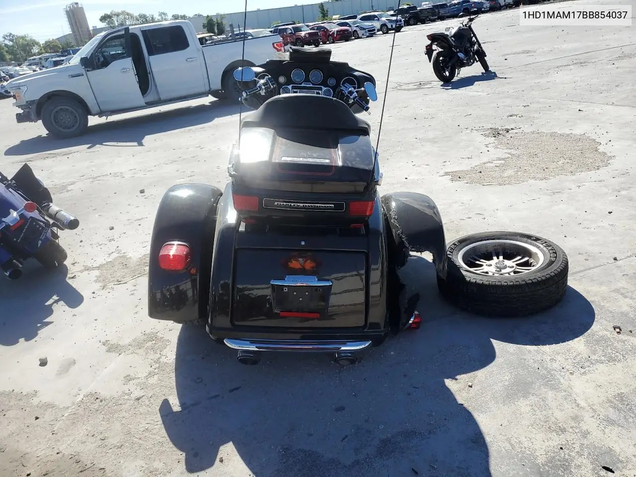 2011 Harley-Davidson Flhtcutg VIN: 1HD1MAM17BB854037 Lot: 51578035