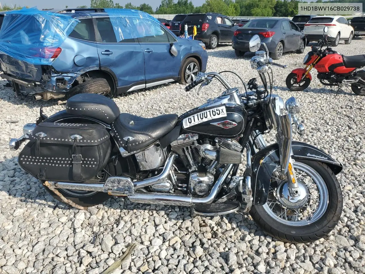 2012 Harley-Davidson Flstc Heritage Softail Classic VIN: 1HD1BWV16CB029738 Lot: 61100165