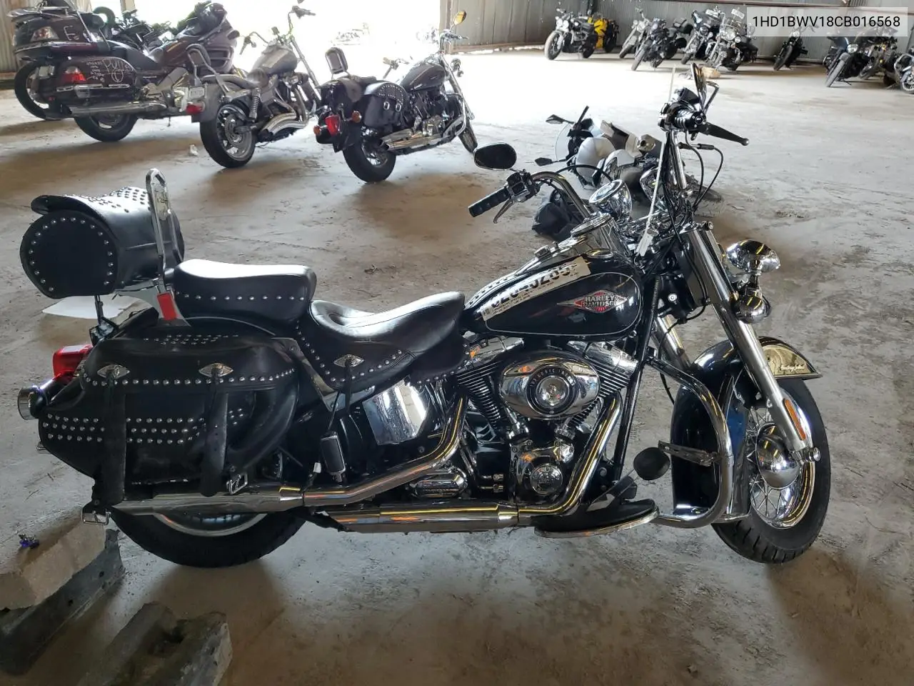 2012 Harley-Davidson Flstc Heritage Softail Classic VIN: 1HD1BWV18CB016568 Lot: 62645265