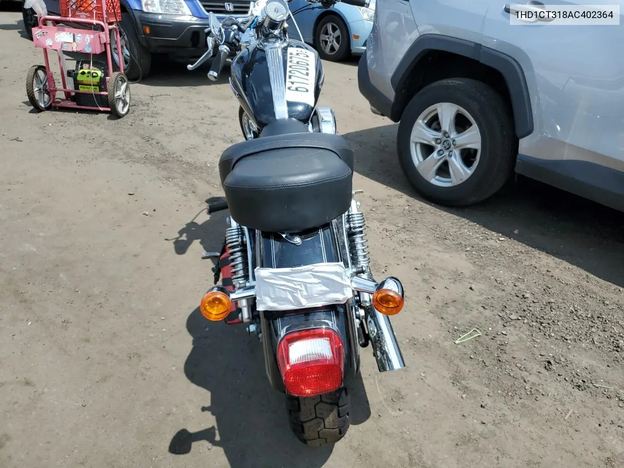 2010 Harley-Davidson Xl1200 C VIN: 1HD1CT318AC402364 Lot: 61720675
