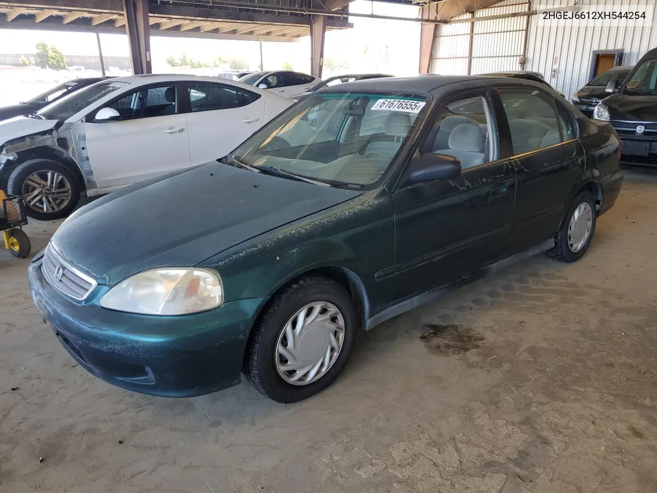 1999 Honda Civic Base VIN: 2HGEJ6612XH544254 Lot: 61676555