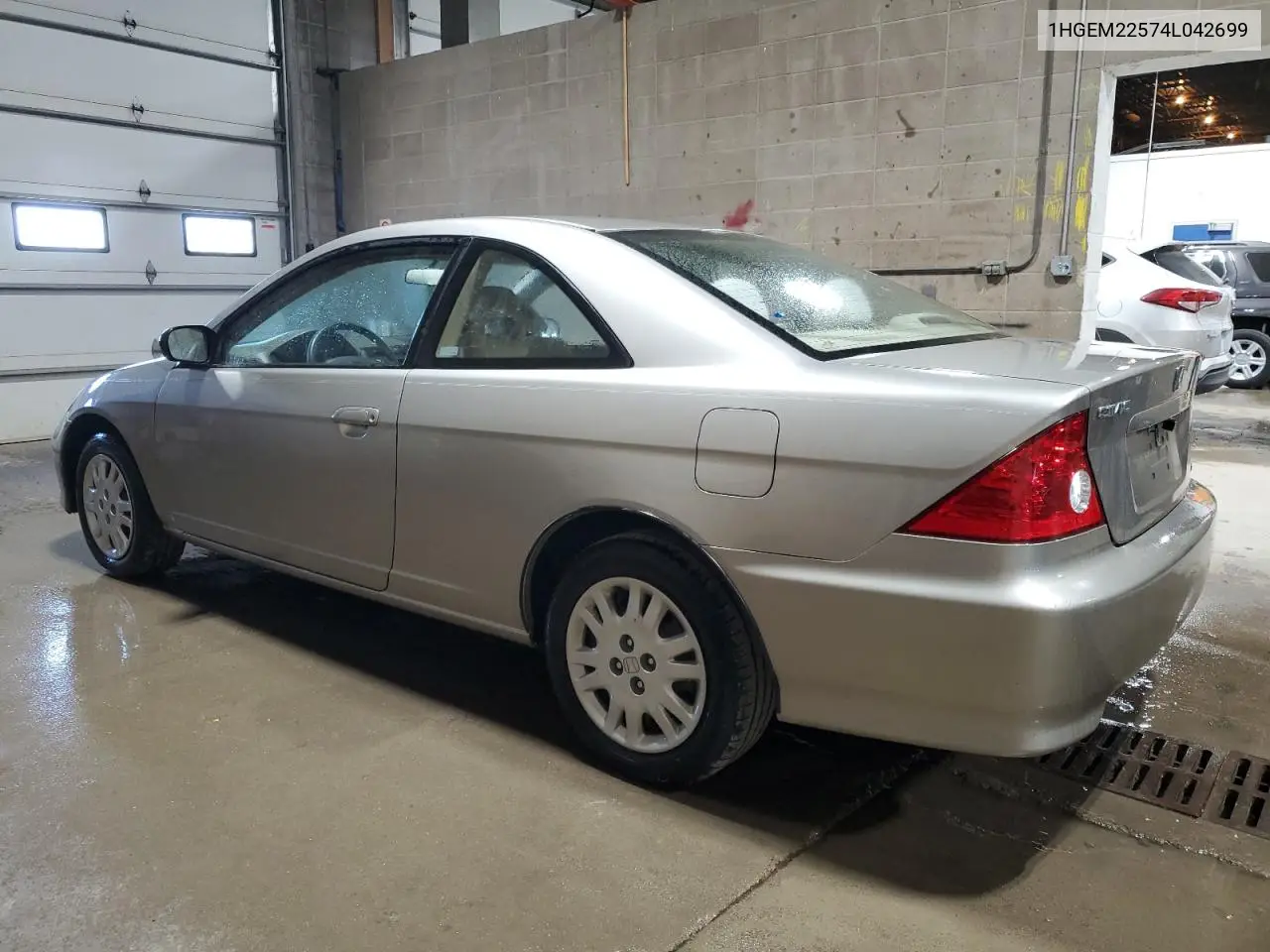 2004 Honda Civic Lx VIN: 1HGEM22574L042699 Lot: 56596165