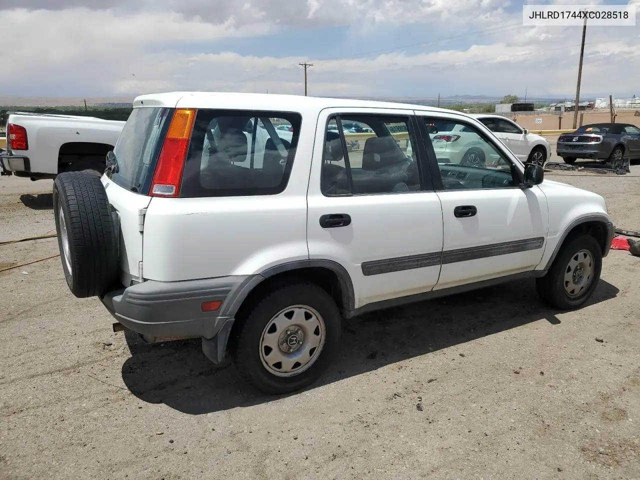 1999 Honda Cr-V Lx VIN: JHLRD1744XC028518 Lot: 55828915