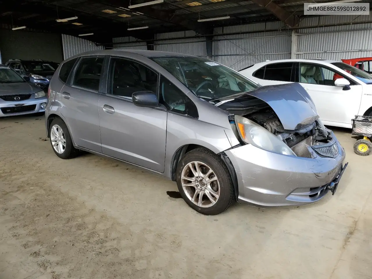 2009 Honda Fit VIN: JHMGE88259S012892 Lot: 56800415
