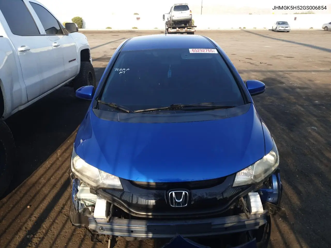 2016 Honda Fit Lx VIN: JHMGK5H52GS006854 Lot: 65292765