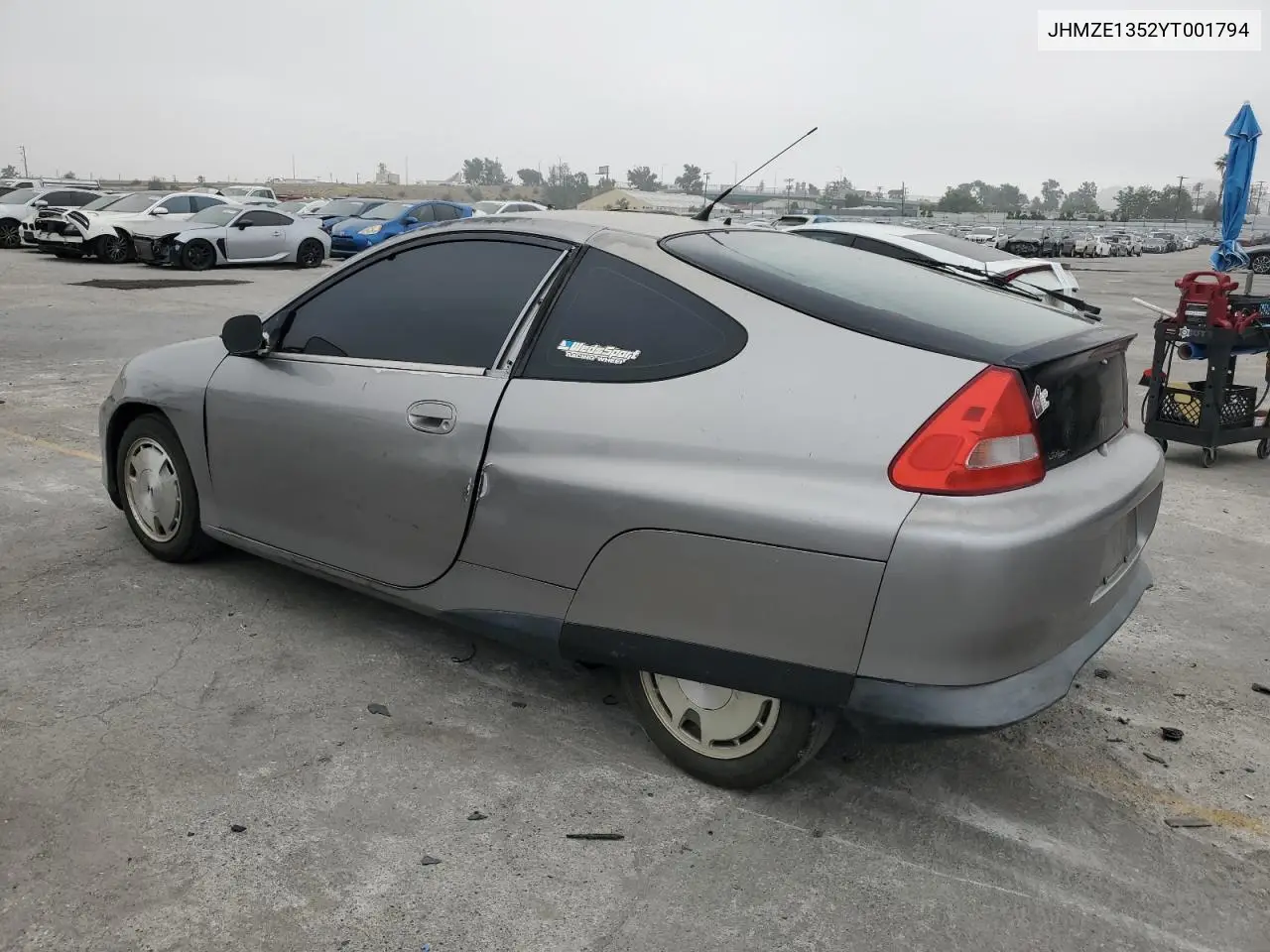 2000 Honda Insight VIN: JHMZE1352YT001794 Lot: 89022435