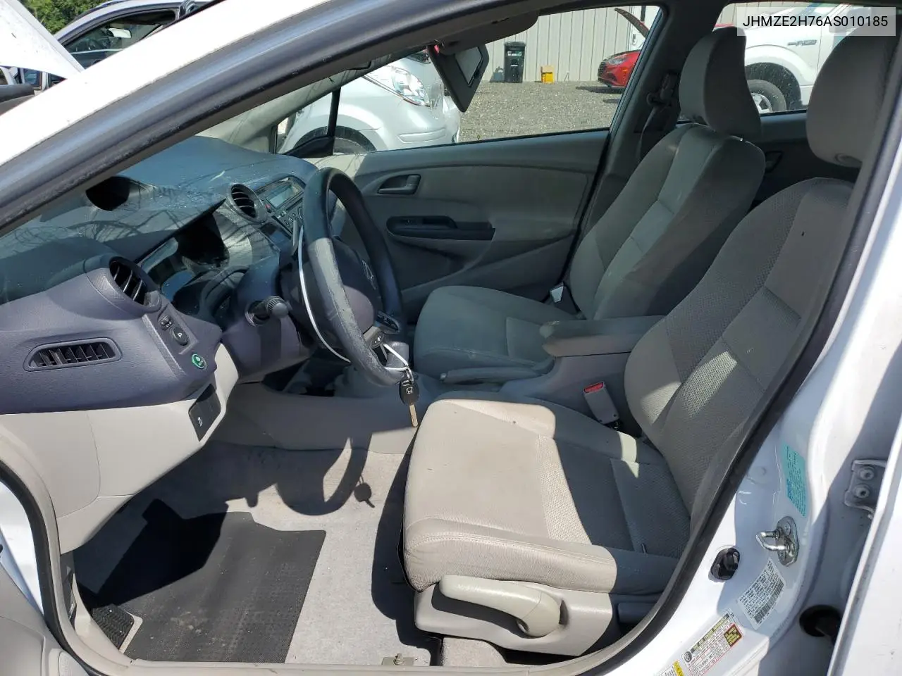 2010 Honda Insight Ex VIN: JHMZE2H76AS010185 Lot: 62018055