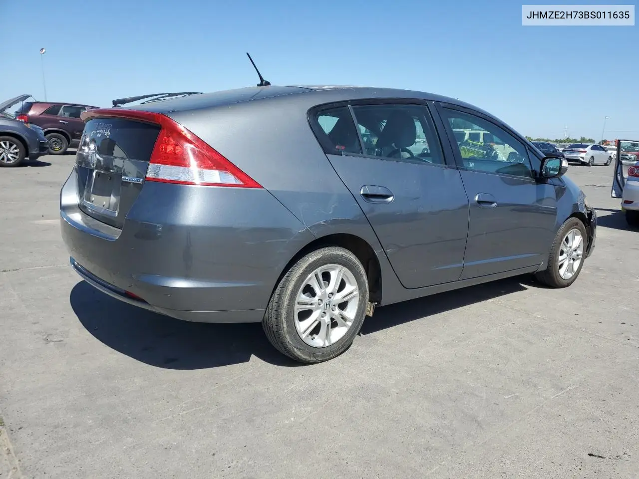2011 Honda Insight Ex VIN: JHMZE2H73BS011635 Lot: 60960565