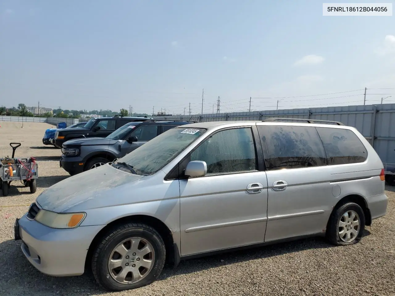 2000 Honda Odyssey Ex VIN: 5FNRL18612B044056 Lot: 59910245