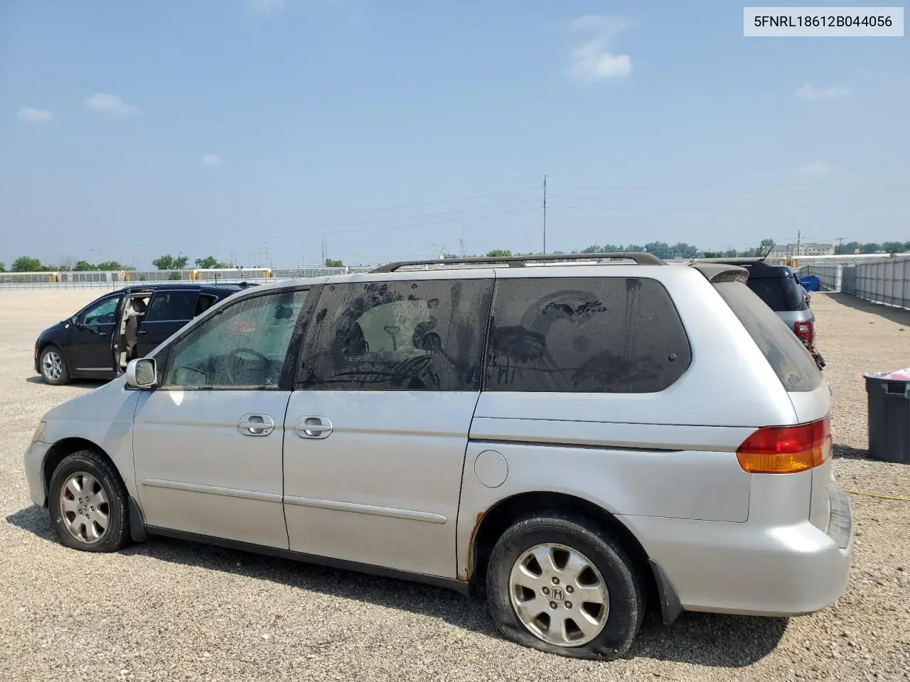 2000 Honda Odyssey Ex VIN: 5FNRL18612B044056 Lot: 59910245