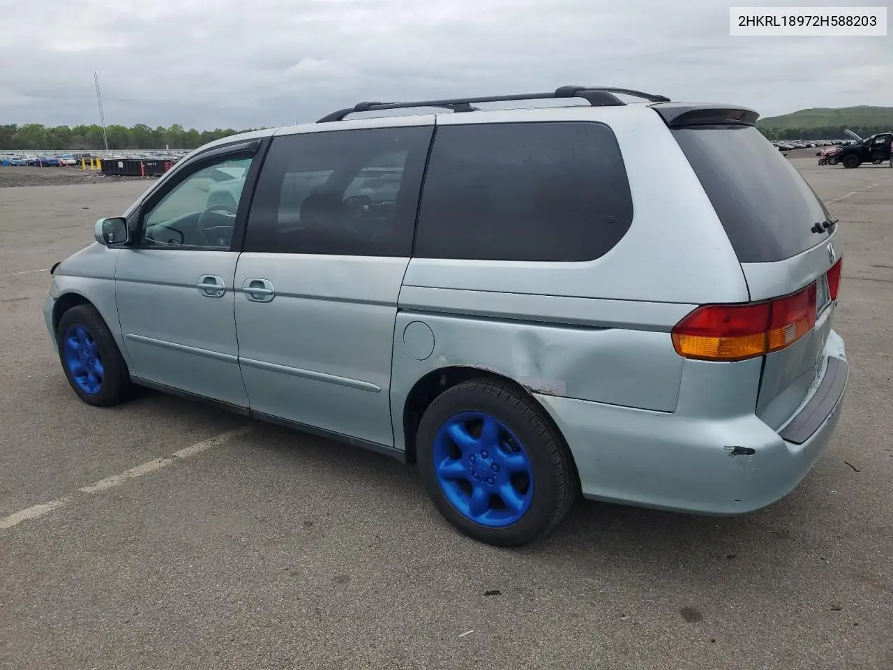 2002 Honda Odyssey Exl VIN: 2HKRL18972H588203 Lot: 56799955