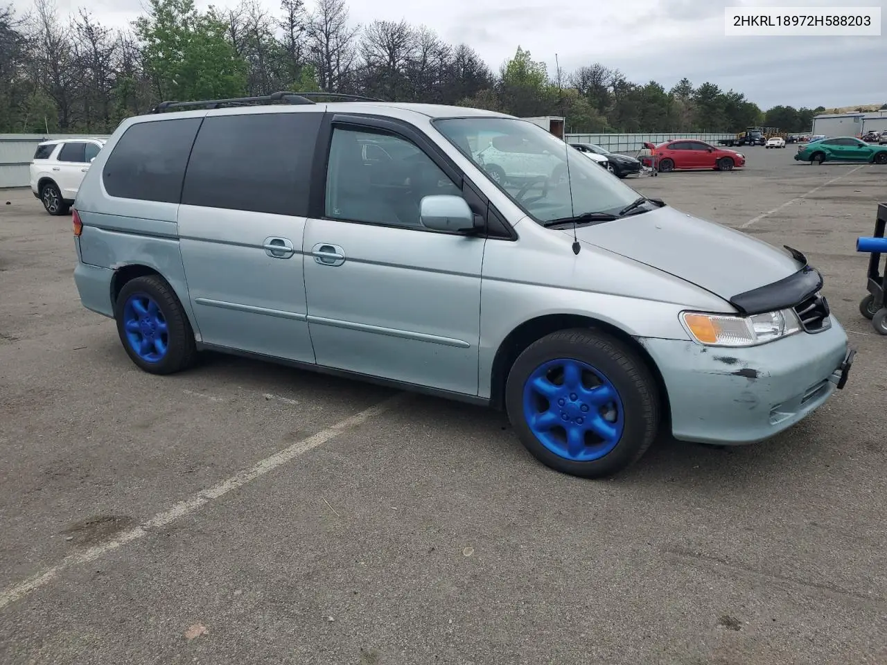 2002 Honda Odyssey Exl VIN: 2HKRL18972H588203 Lot: 56799955