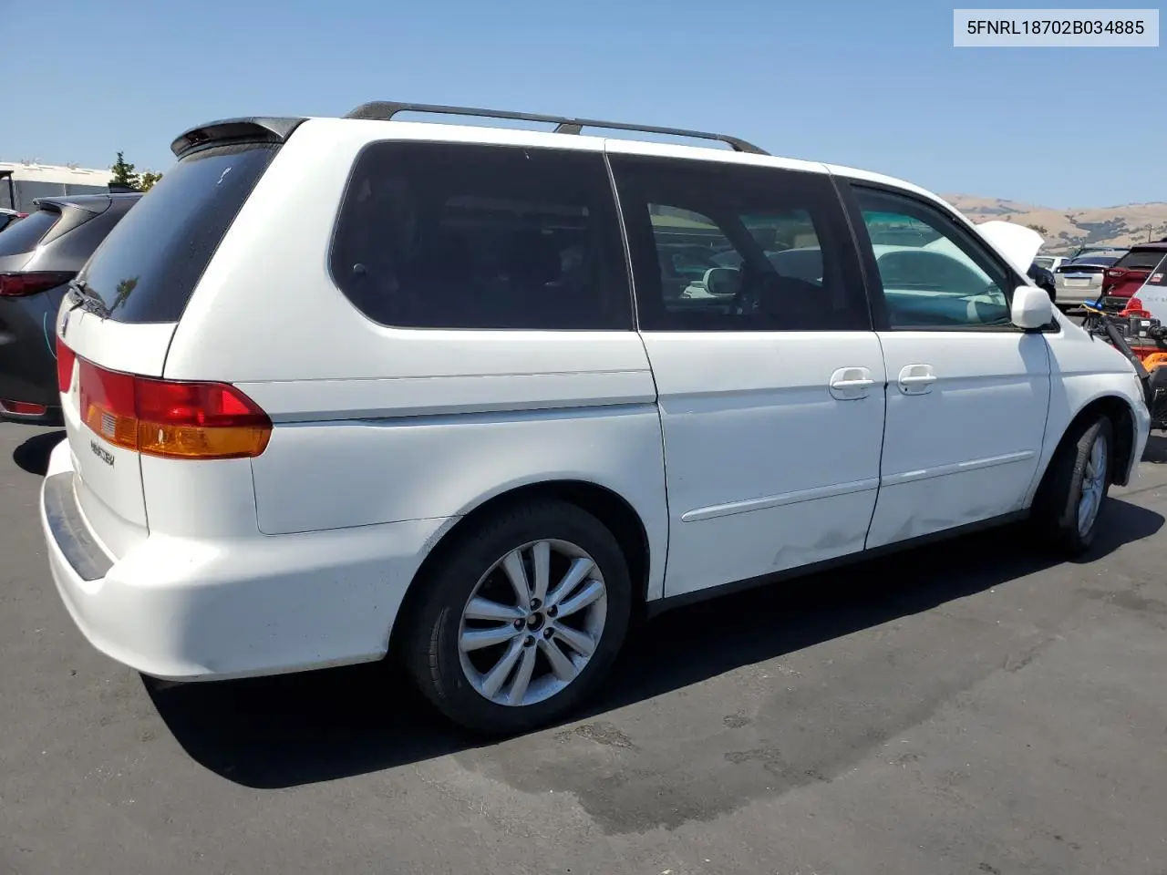 2002 Honda Odyssey Exl VIN: 5FNRL18702B034885 Lot: 61873755