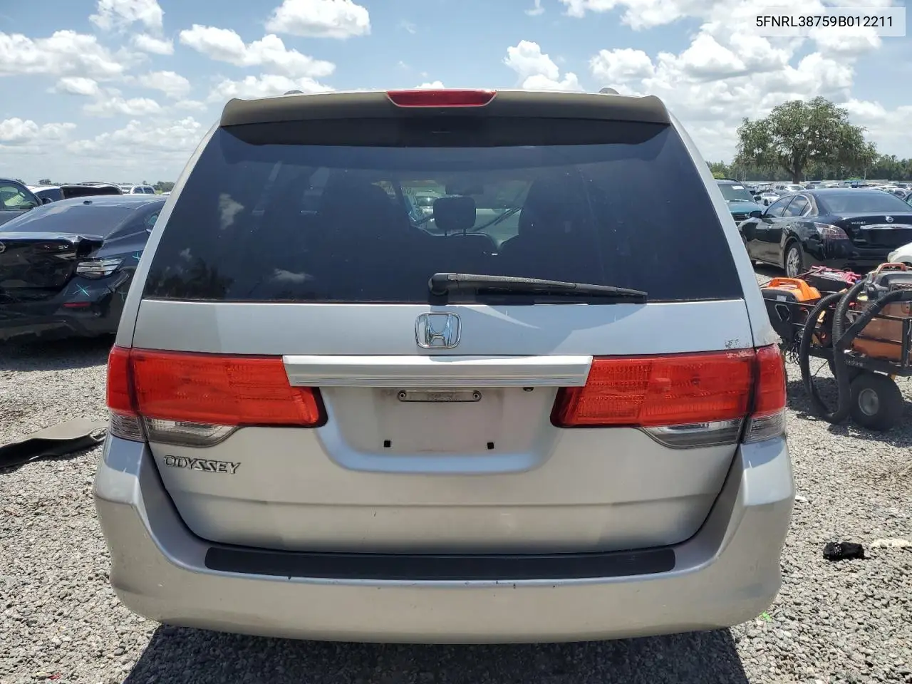 2009 Honda Odyssey Exl VIN: 5FNRL38759B012211 Lot: 63040575