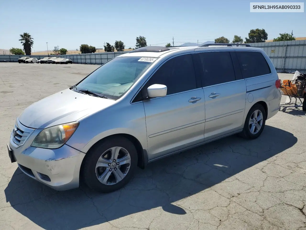 2010 Honda Odyssey Touring VIN: 5FNRL3H95AB090333 Lot: 63195395
