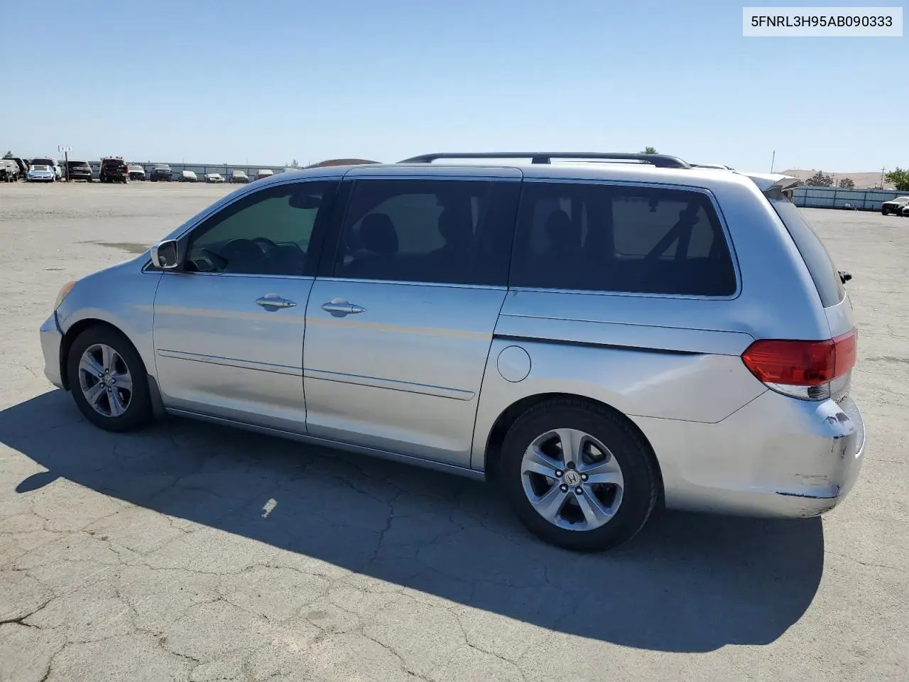 2010 Honda Odyssey Touring VIN: 5FNRL3H95AB090333 Lot: 63195395
