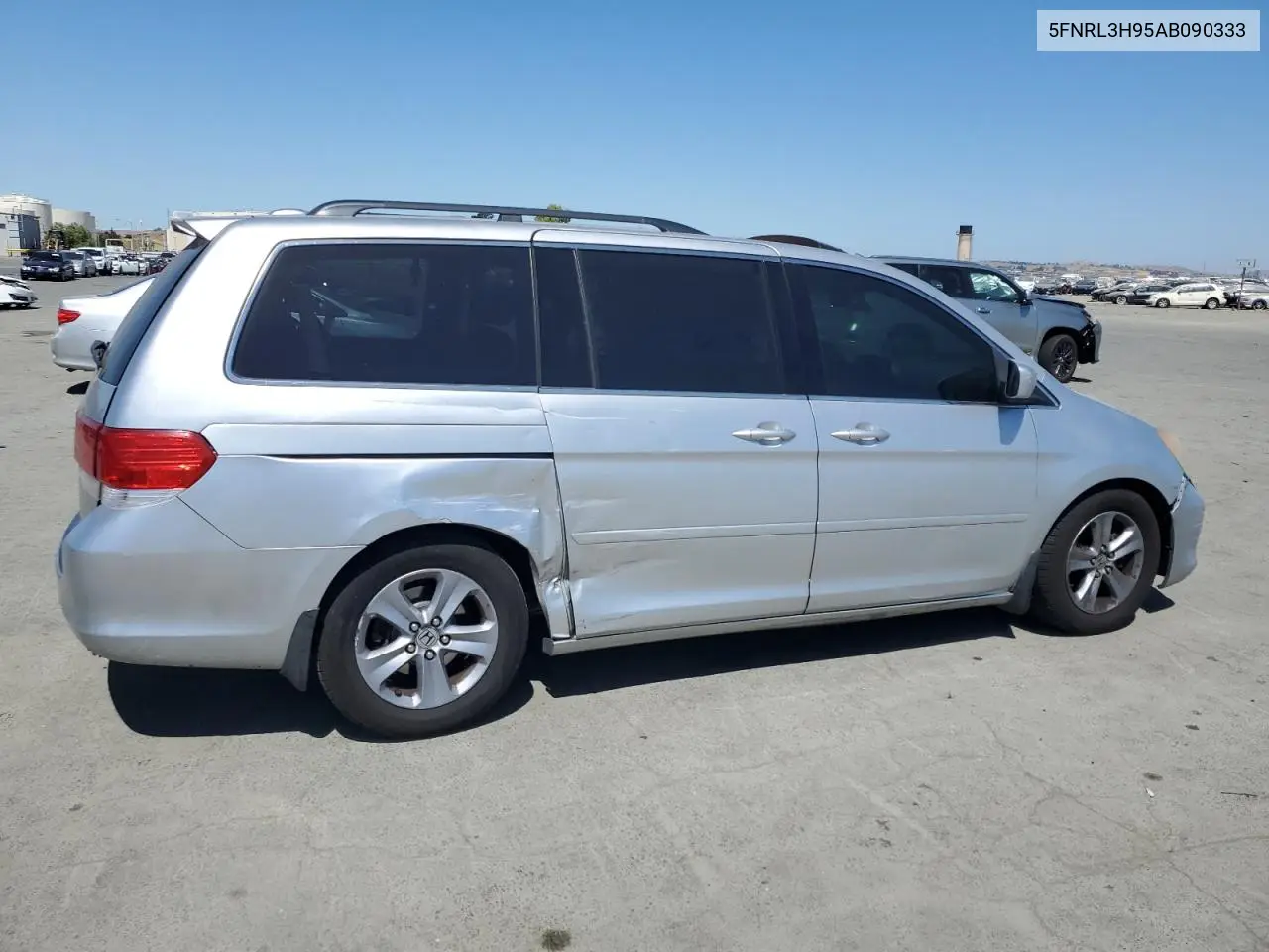 2010 Honda Odyssey Touring VIN: 5FNRL3H95AB090333 Lot: 63195395