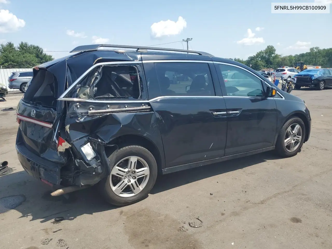 2012 Honda Odyssey Touring VIN: 5FNRL5H99CB100909 Lot: 62460195