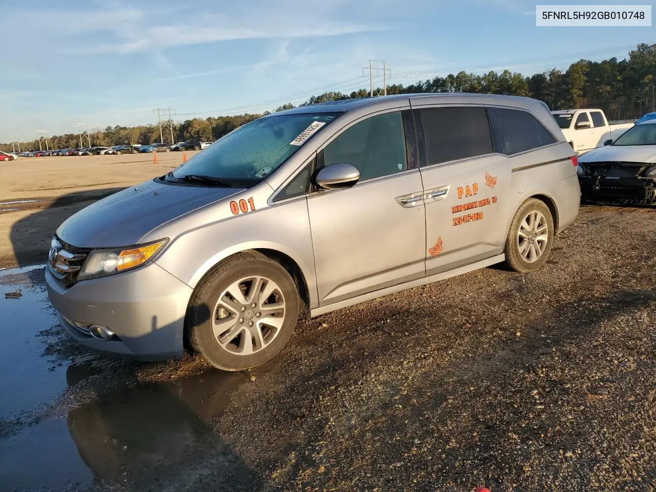 2016 Honda Odyssey Touring VIN: 5FNRL5H92GB010748 Lot: 48997425