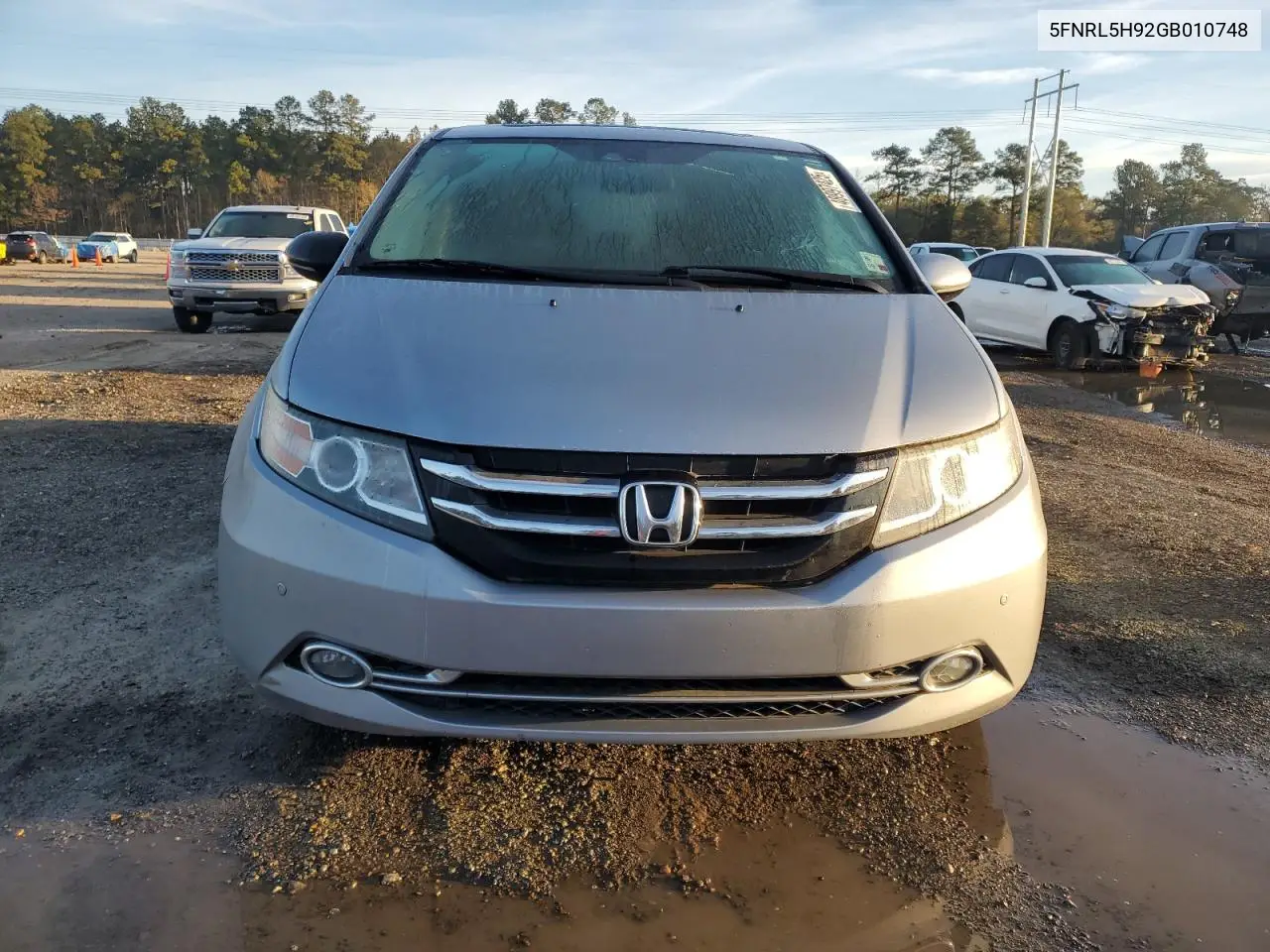 2016 Honda Odyssey Touring VIN: 5FNRL5H92GB010748 Lot: 48997425