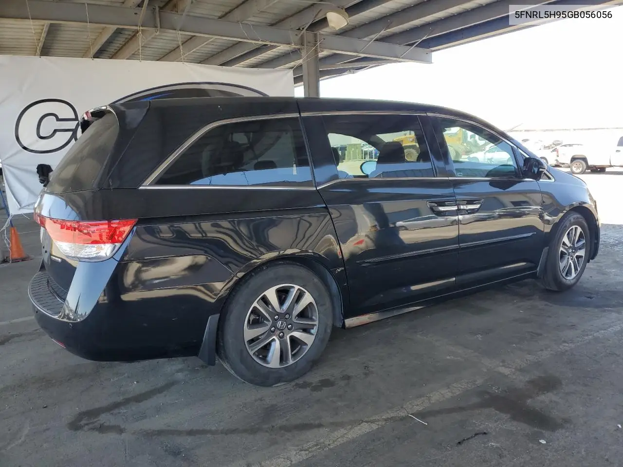 2016 Honda Odyssey Touring VIN: 5FNRL5H95GB056056 Lot: 62430495